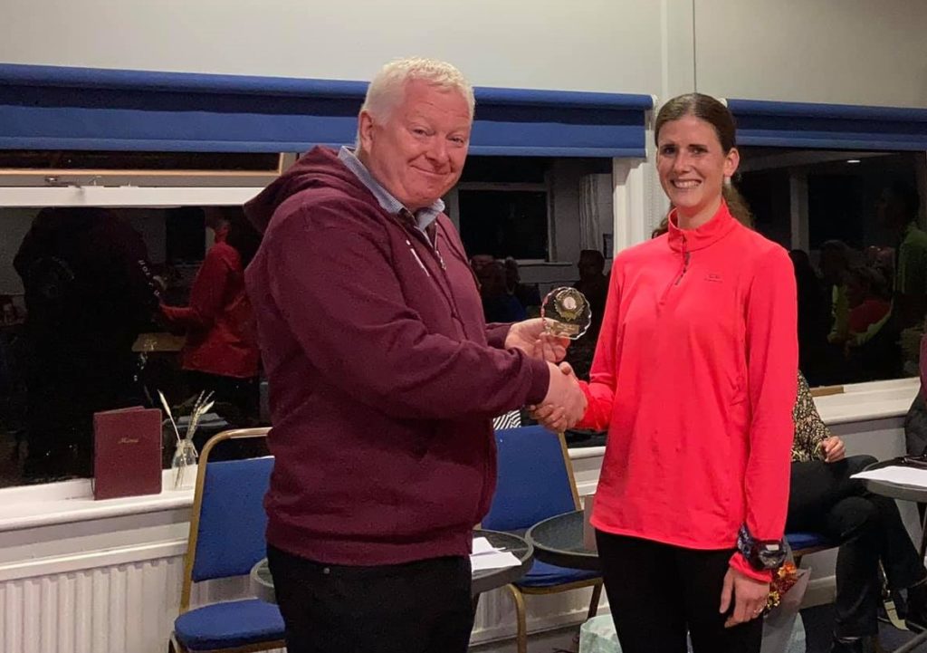 Paul Morley presents Laura Luxton with Winter Handicap trophy