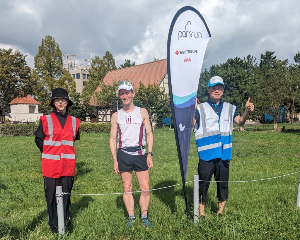 Michael Dargue with two parkrun volunteers