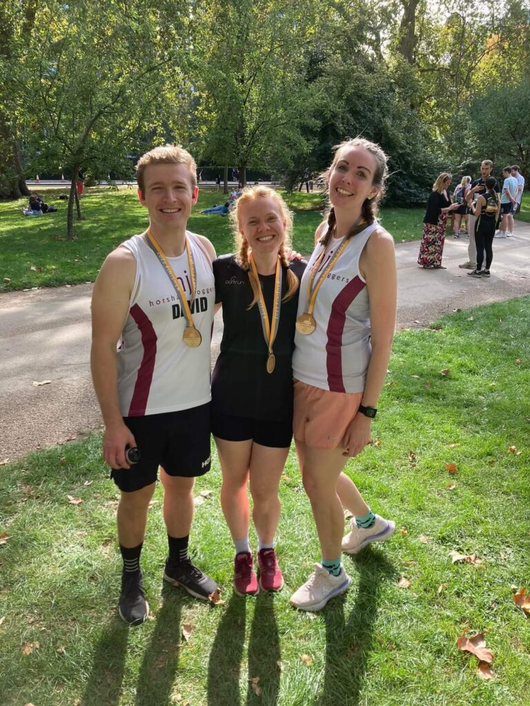 Smiling Horsham Joggers after completing the Royal Parks Half