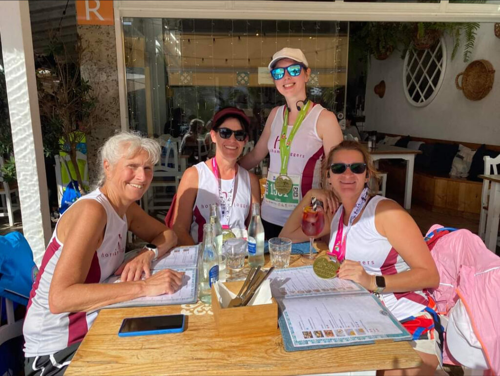 A group of runners sitting round a table in a restaurant