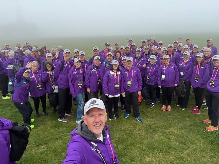 A group of Horsham Joggers in purple London marathon kit