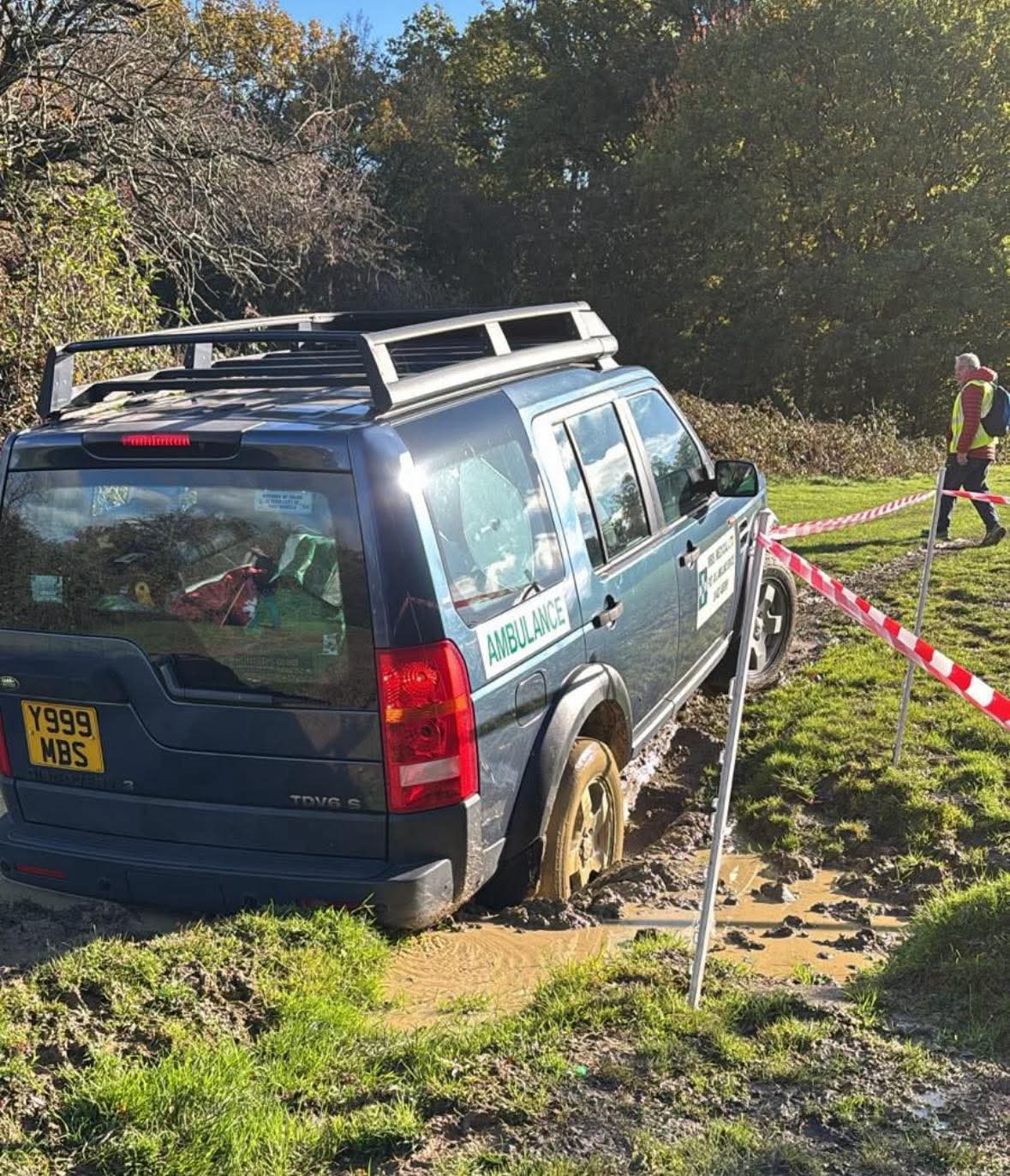 A 4 by 4 vehicle stuck in mud