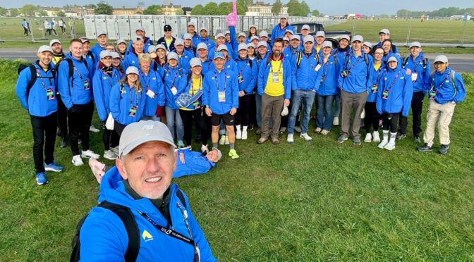 A group of Horsham Joggers wearing volunteer kit at London Marathon
