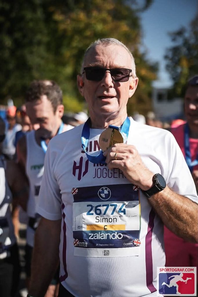 Simon Markham with medal